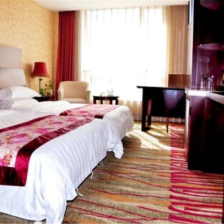 Dalian New Garden Hotel Exterior foto